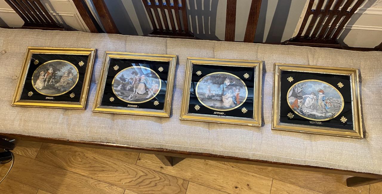 Set of Prints in  églomisé glass mounts, the Four Seasons 